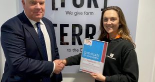 Forterra Nia Lewis receiving the Clay Drying and Firing Student Award