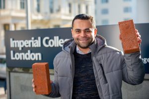 ImperialCollegeAshraf 072 Ashraf Nayel PhD student at Imperial College London holding materials for his experiments
