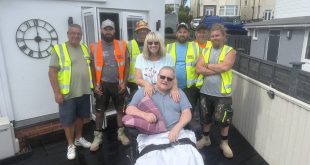 Keith and Linda Parry with volunteers 3