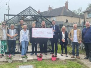 Local partnership delivers new greenhouse for Wishaw residents