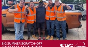 Max Small (centre) surrounded after his win by the SIG Roofing Southampton branch team