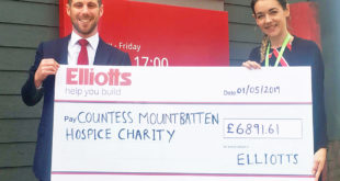 Tom Elliott Managing Director of Elliotts presents the cheque to Rachel Rawlings from Countess Mountbatten Hospice Charity