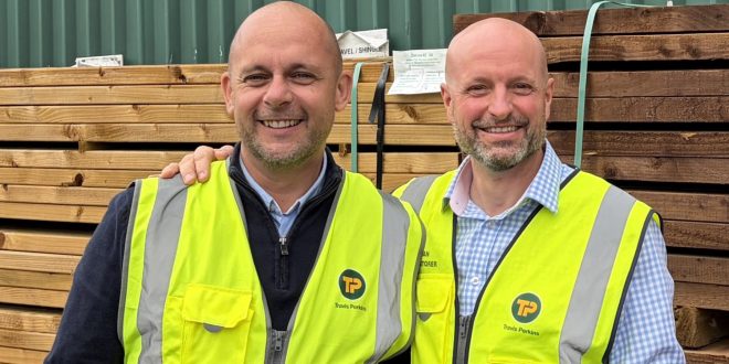 Travis Perkins celebrates directors’ three decades