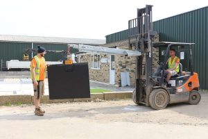warehouse staff quality checking paving slab 2